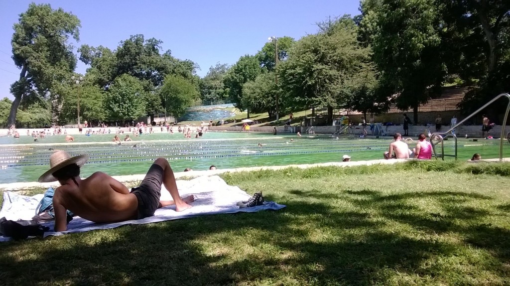 Image of people relaxing at Deep Eddy Pool